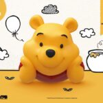 Winnie The Pooh Small Vinyl Bank laid-back Winnie 17 cm