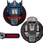 TRANSFORMERS - 40TH ANNIVERSARY - TWIN SET OF PIN BADGES