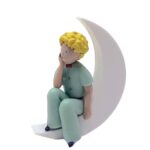 LITTLE PRINCE SITTING ON THE MOON FIGURE