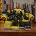 COUCH CLOWDER WITH 48 DISPLAY CATS