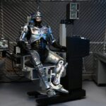 RoboCop Action Figure Ultimate Battle Damaged RoboCop with Chair 18 cm