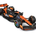 F1 MC LAREN MCL38 WITH NORRIS FIGURE - 1:24 DIE-CAST MODEL